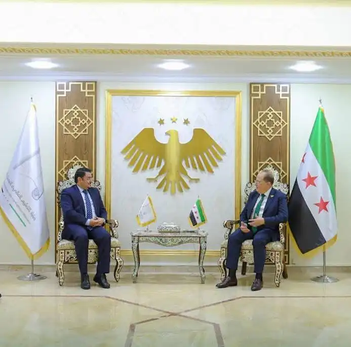 Baker discusses strengthening scientific and academic collaboration with the Syrian Minister of Higher Education.