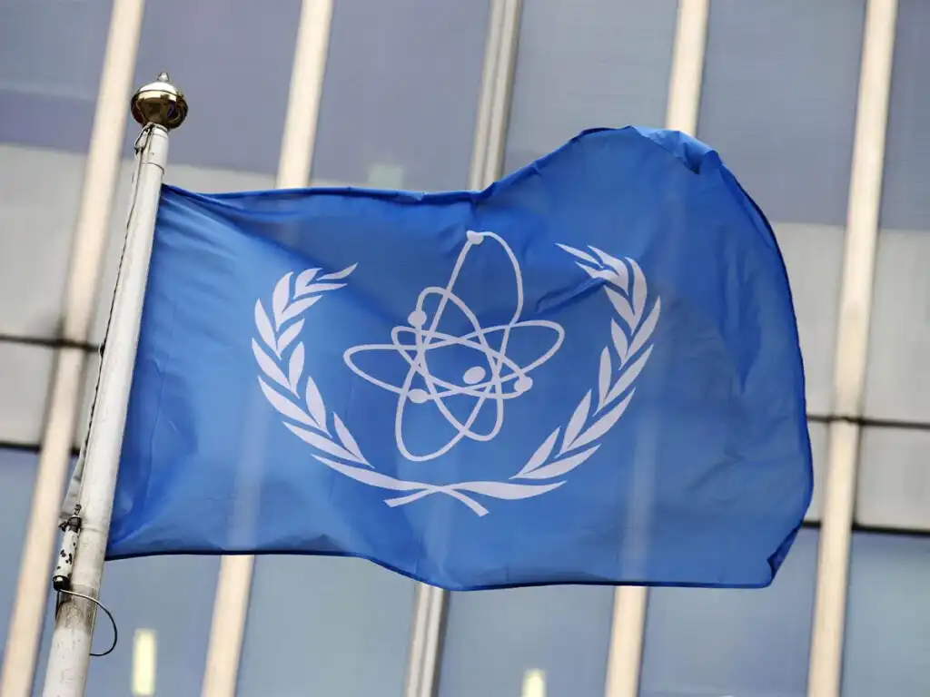 The International Atomic Energy Agency refers Iran to the Security Council for its nuclear non-compliance.