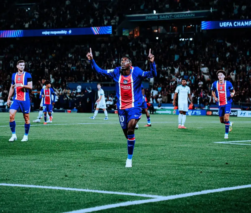 Paris Saint-Germain begins its title defense with a stunning six-goal victory against Slovan Bratislava.