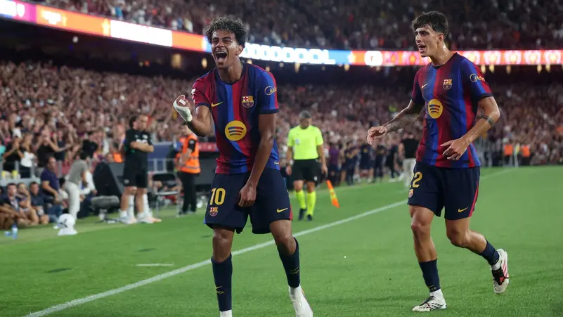 Barcelona dominates Rayo Vallecano with a 5-0 victory, maintaining their perfect start in La Liga.