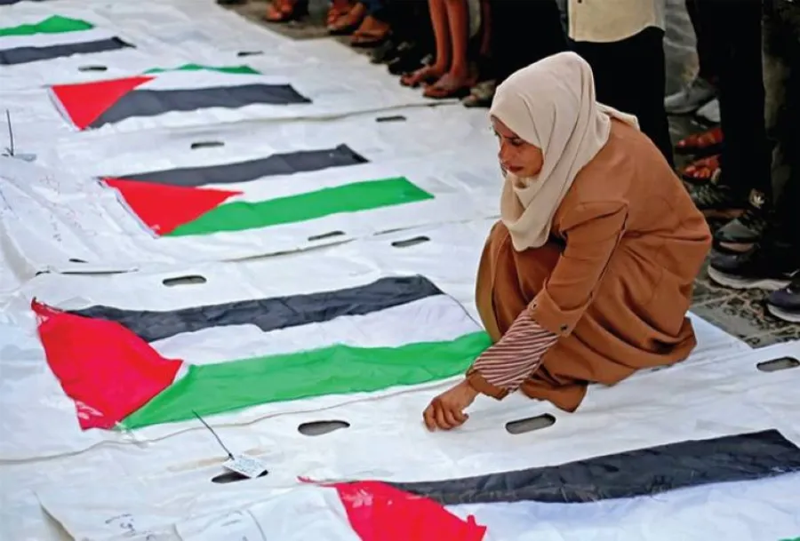 Twelve martyrs and forty-two injured in Israeli shelling on Tal Al-Hawa in Gaza, with ongoing assaults in the West Bank and Quneitra.